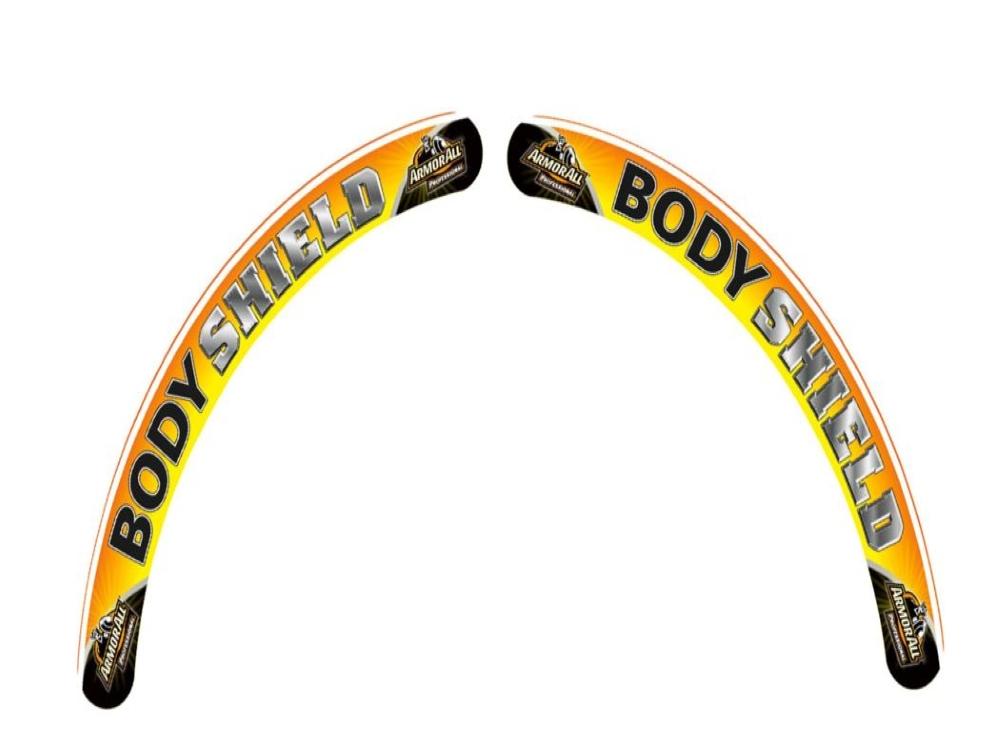 Underside view of a car showing a black plastic splash shield